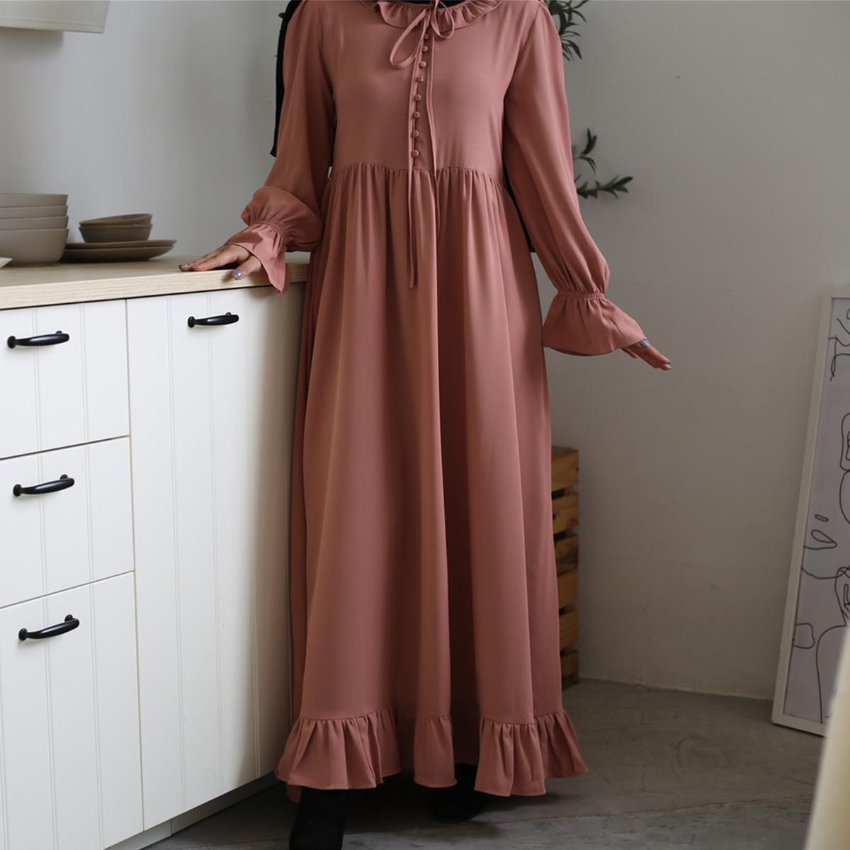 Nouvelle robe musulmane à grande balançoire avec coutures de couleur unie pour femmes