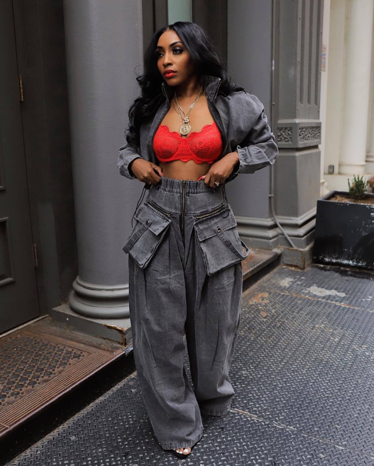 Women’s black cropped denim jacket and wide leg cargo pants