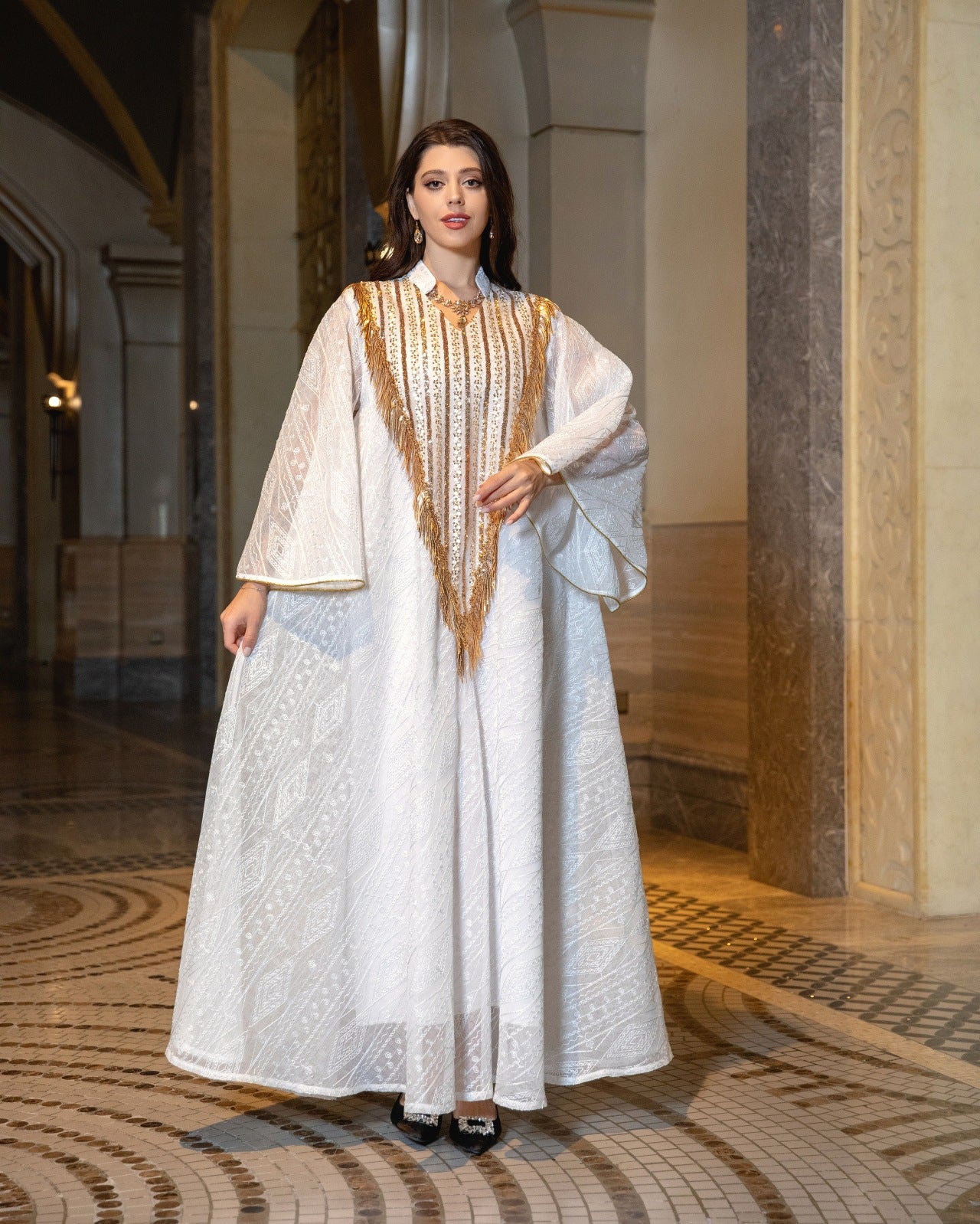 HS6648 A long robe with mesh sequins and embroidered details; an elegant and sophisticated dress.